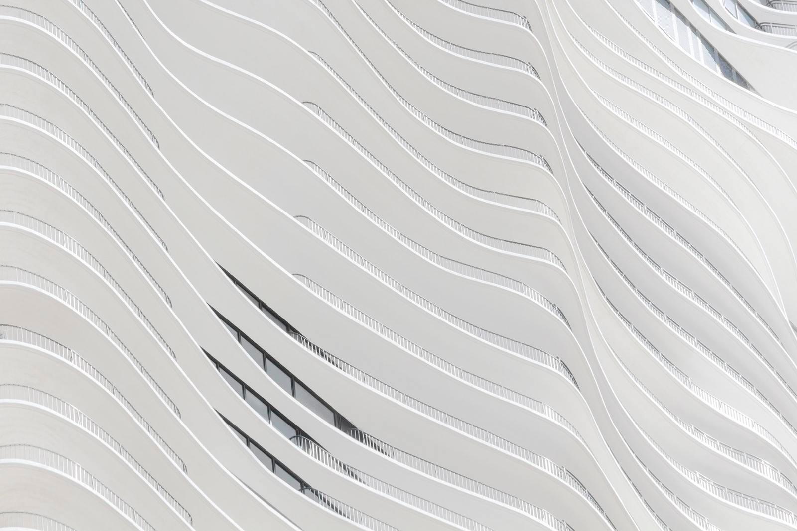 a close up of a building with wavy lines on it