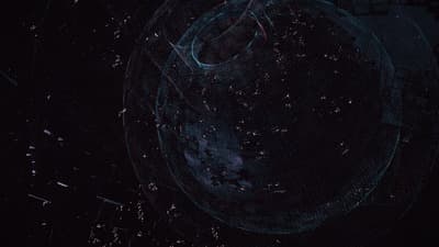 a dark background with a circular object in the middle