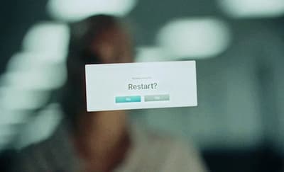 a person holding a business card in their hand