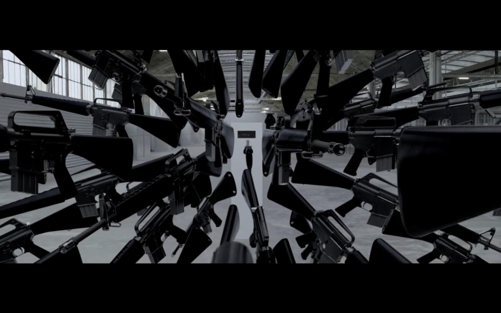 a bunch of guns that are in a room