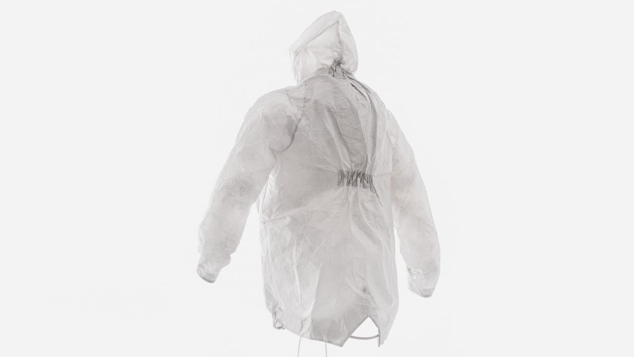 a person in a white raincoat is walking away from the camera