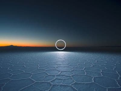 a photo of a circle in the middle of a desert