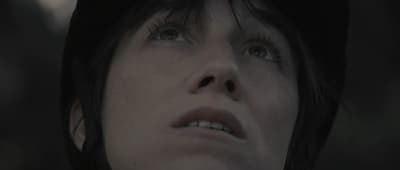 a close up of a person wearing a hat