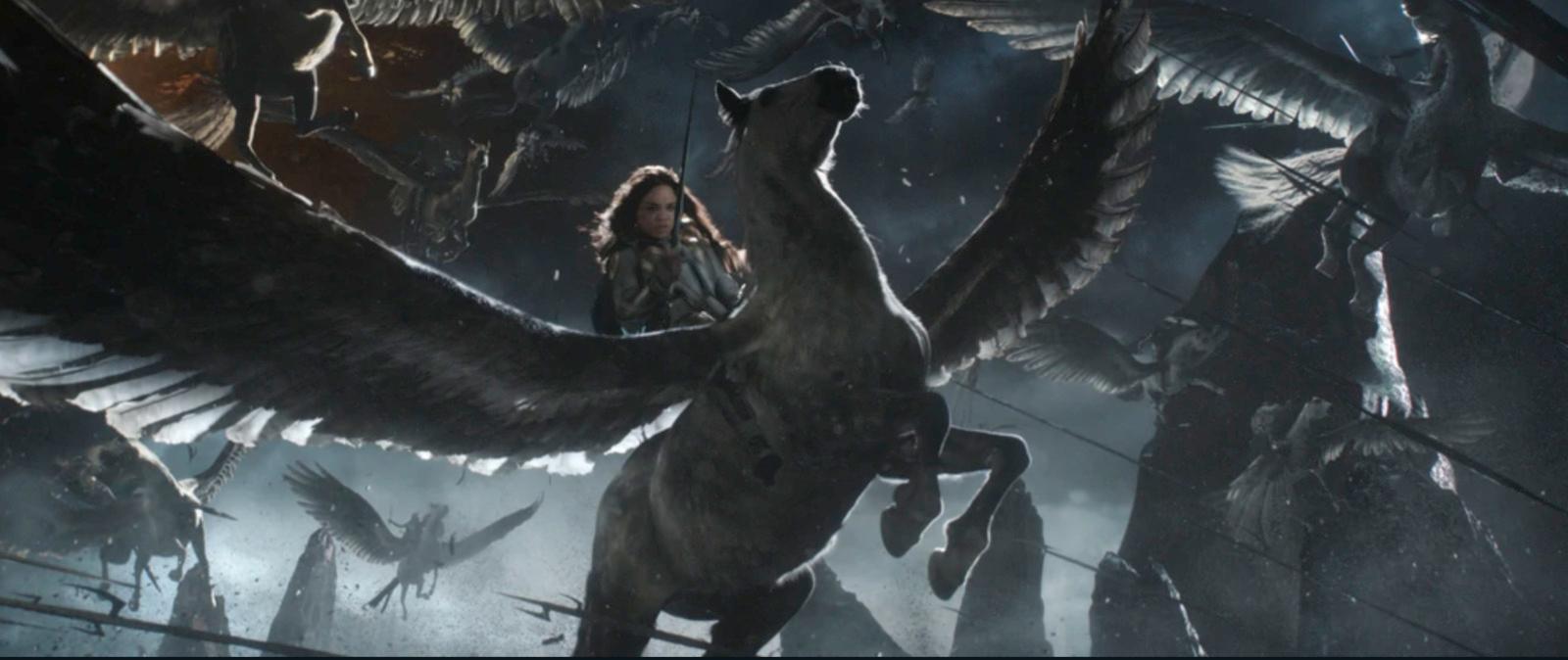 a group of dinosaurs in a dark forest