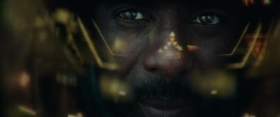 a close up of a man wearing a helmet