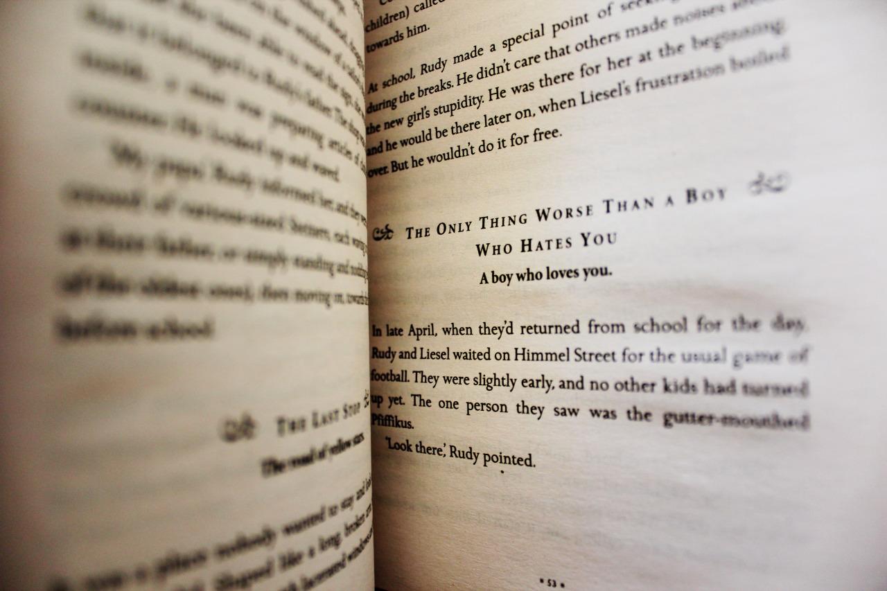 a close up of a book with writing on it