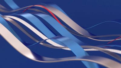 a close up of a metal object with a blue background