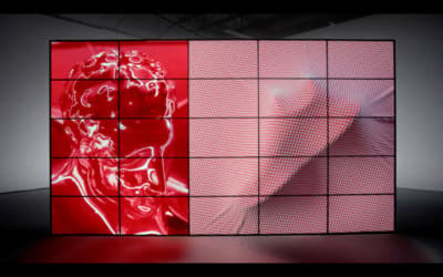 a red screen with a picture of a man on it