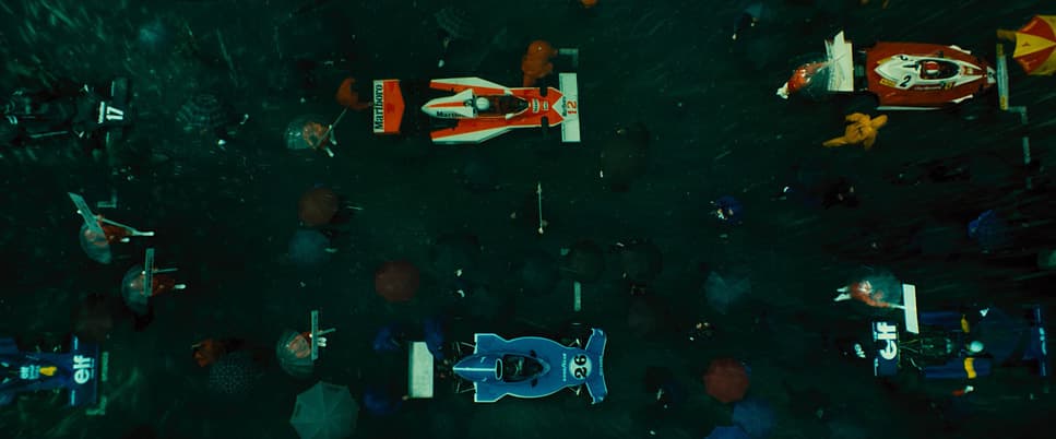 an aerial view of a group of toy cars