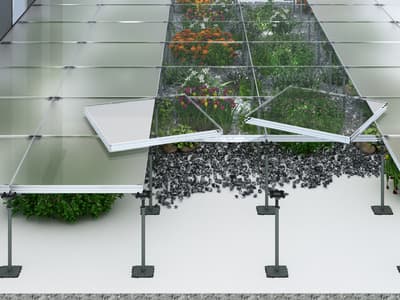 a picture of a building with plants growing inside of it