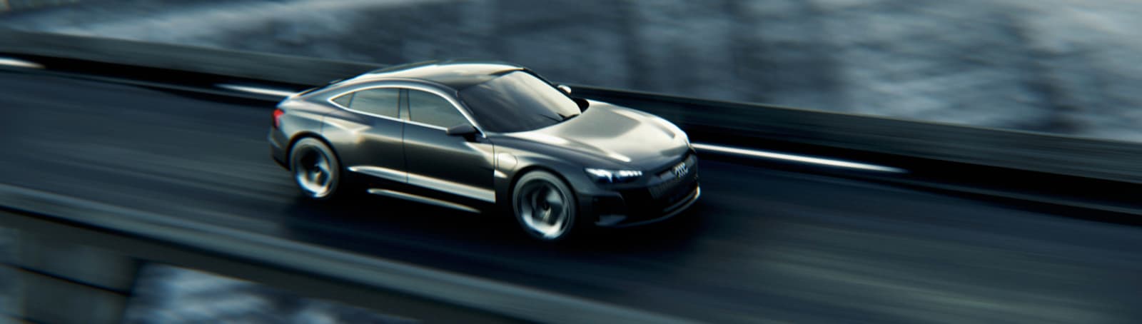 a silver car driving down a highway next to a bridge