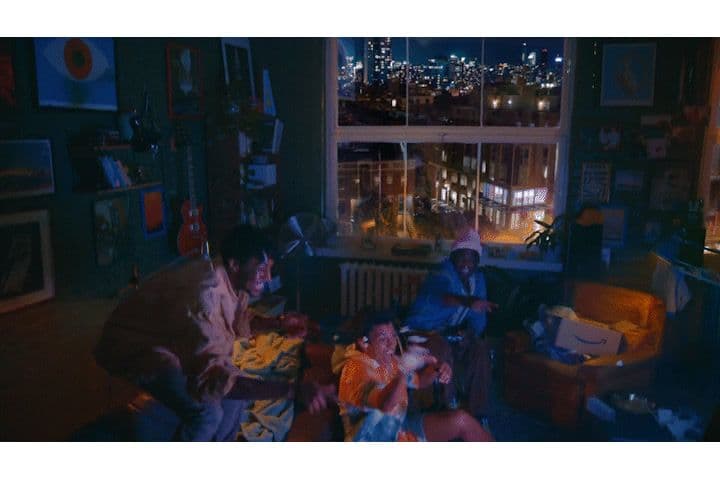a group of people sitting around a living room