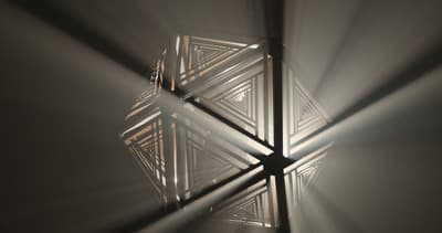 a picture of a light shining through a window