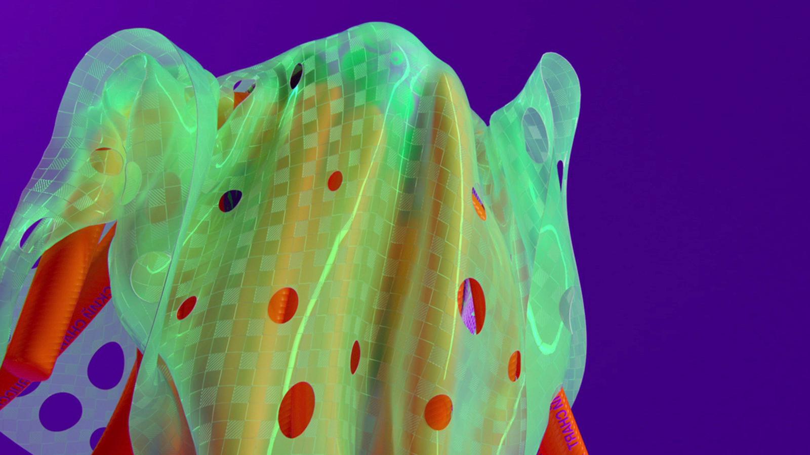 a close up of a colorful object with a purple background