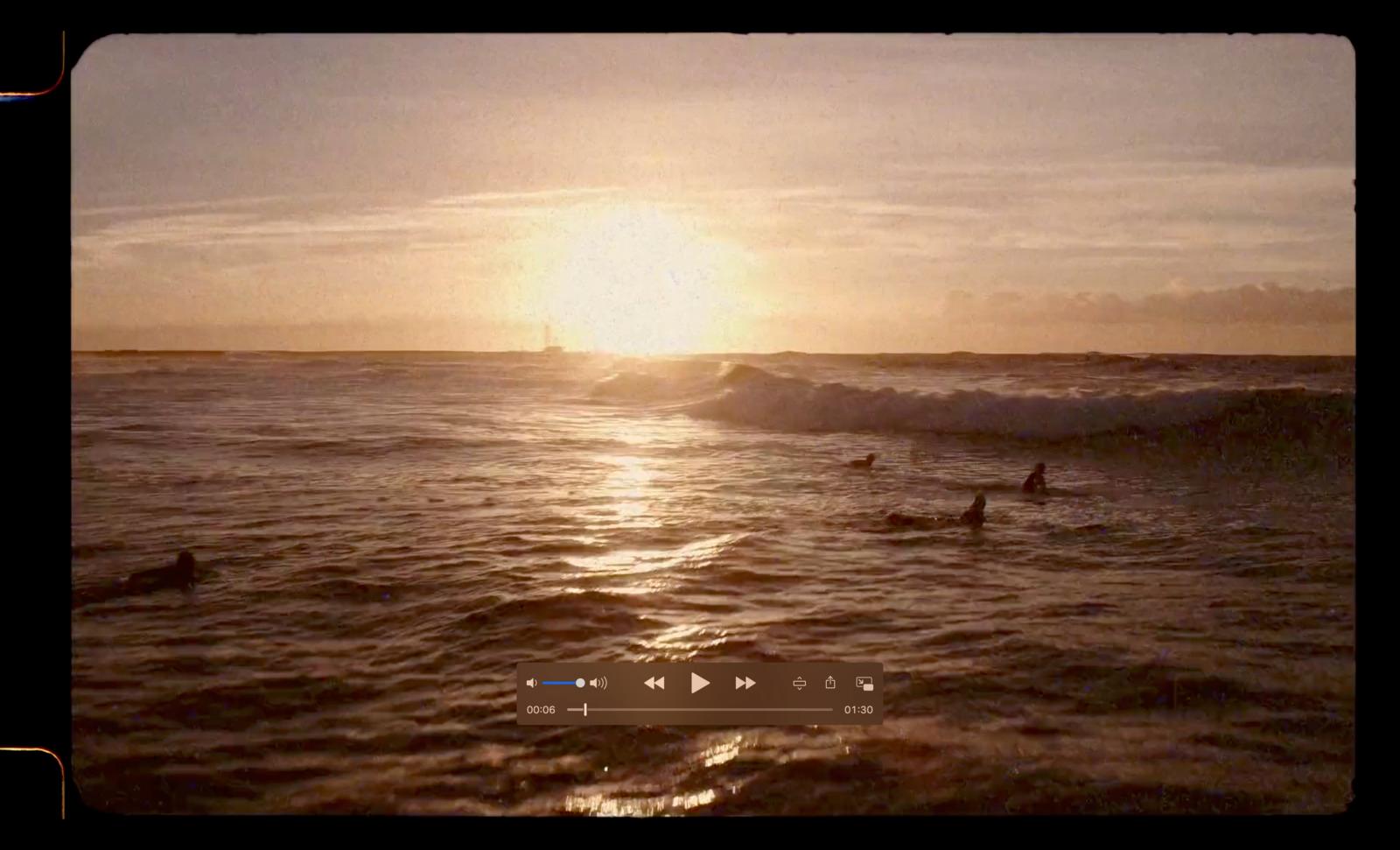 a group of people riding surfboards on top of a wave