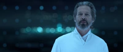 a man with a beard and a white shirt