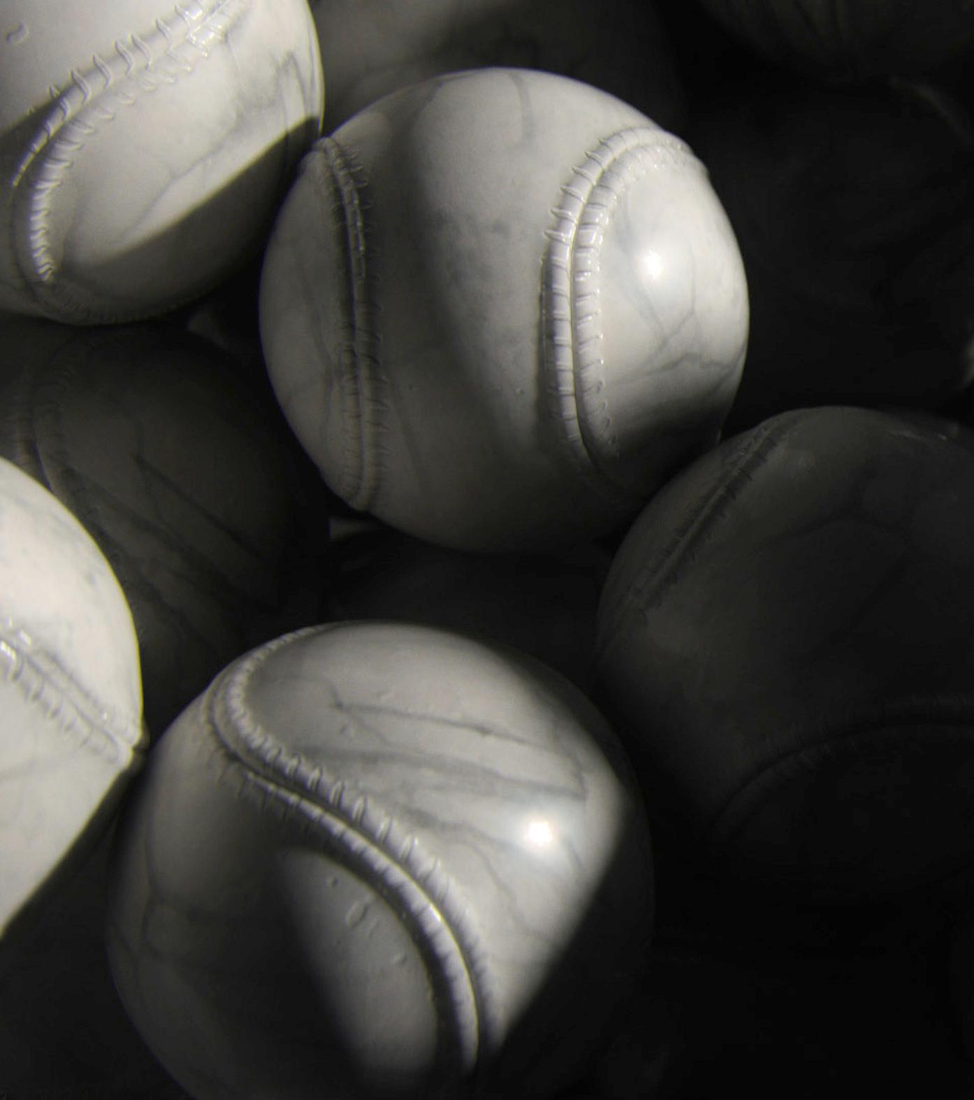 a close up of a bunch of white balls