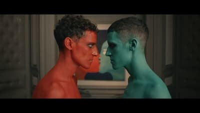 a couple of men standing next to each other