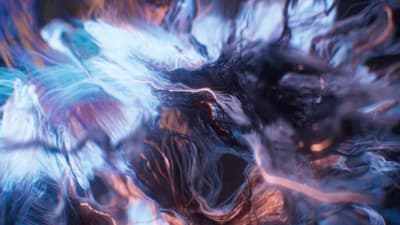 a blurry image of blue and orange feathers