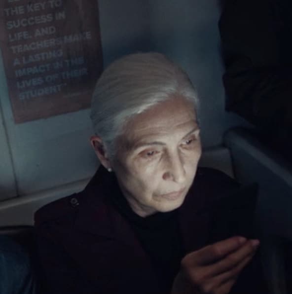 an older woman looking at her cell phone