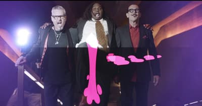 a group of men standing next to each other on a stage