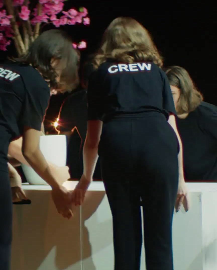 a couple of people standing next to each other