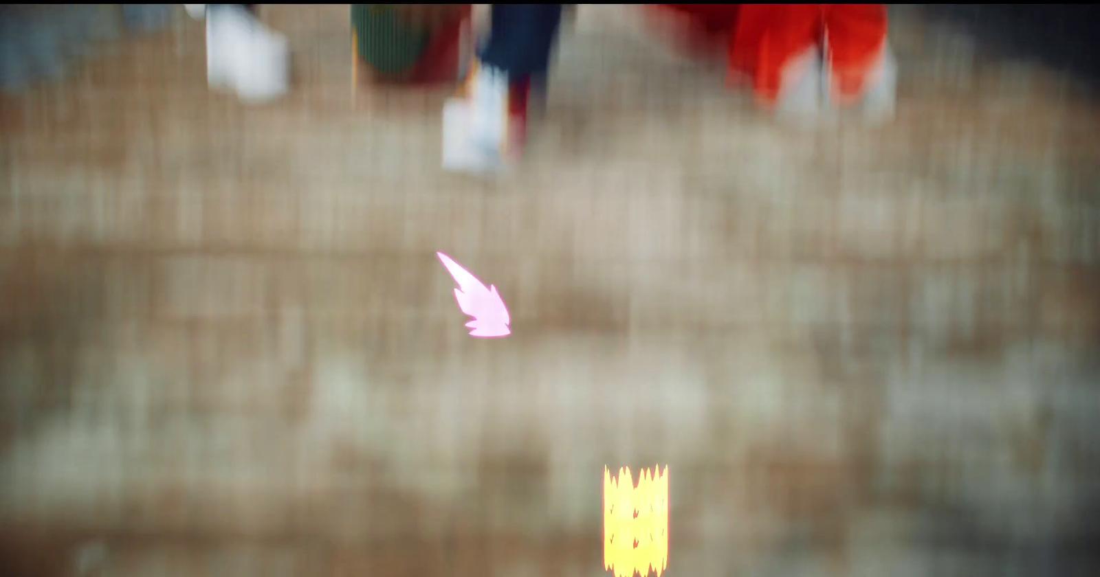 a blurry photo of a bird flying over a building