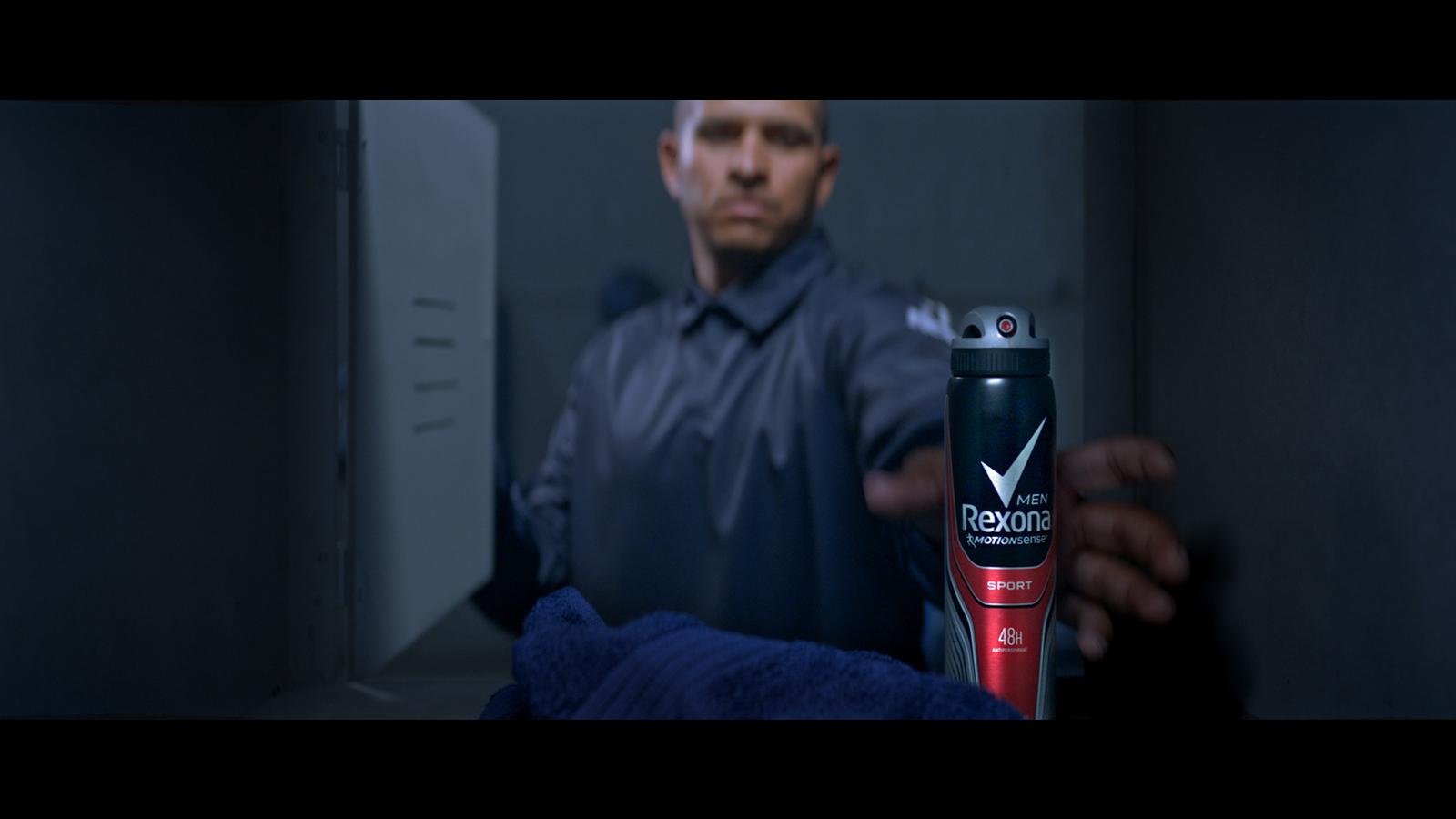 a man holding a hair dryer in his hand