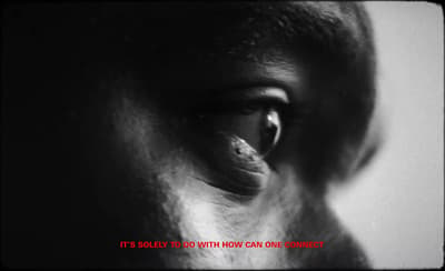 a black and white photo of a person's eye