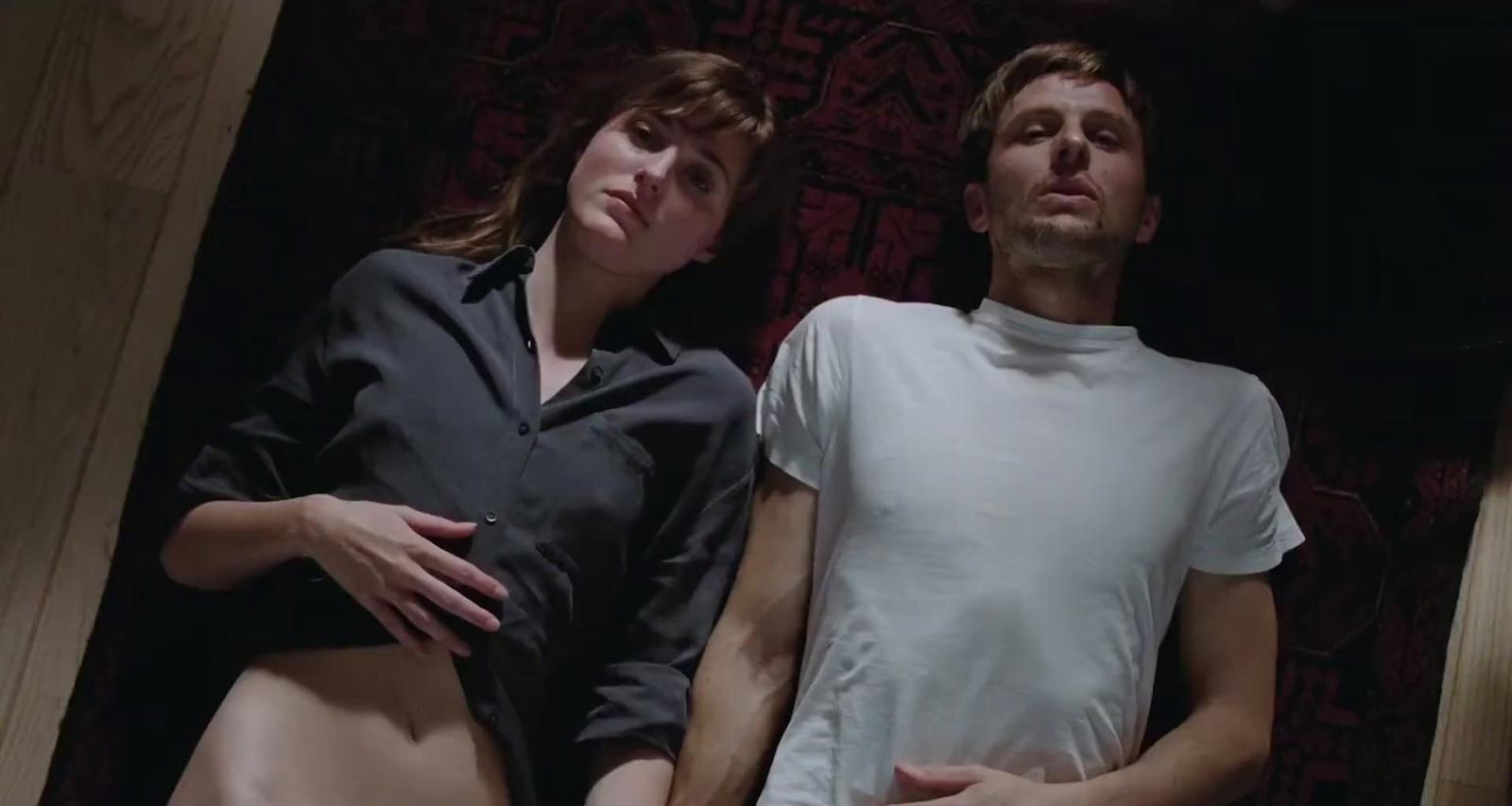 a man and a woman standing next to each other