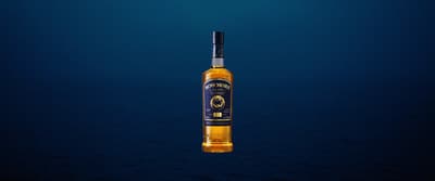 a bottle of liquor floating in the air