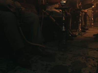 a group of people sitting in a room next to each other
