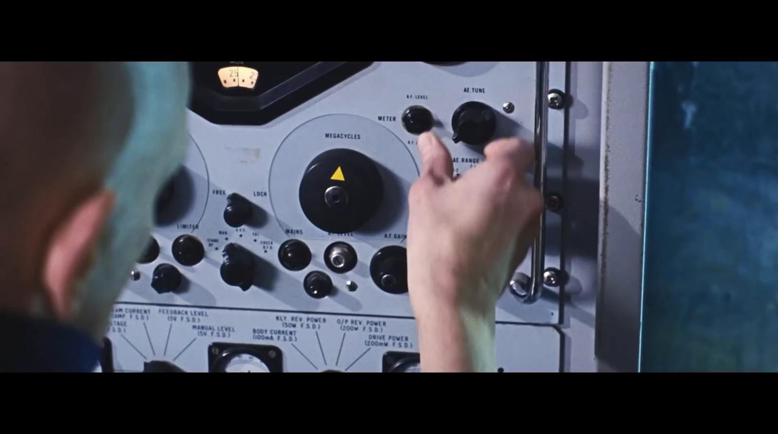 a close up of a person touching buttons on a machine