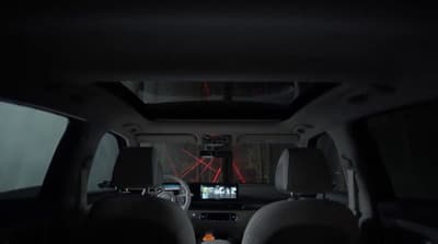 the interior of a vehicle with a view of the dashboard