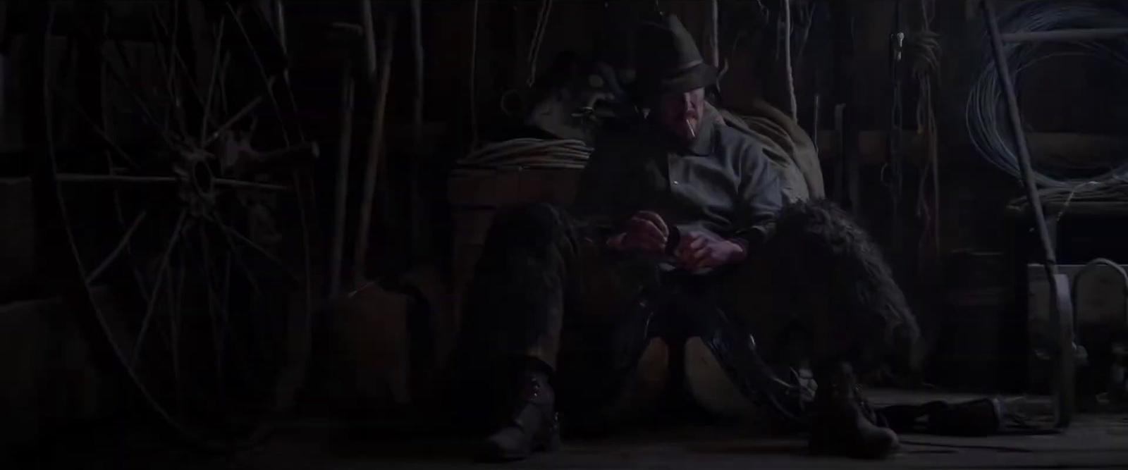 a man sitting on a chair in a room