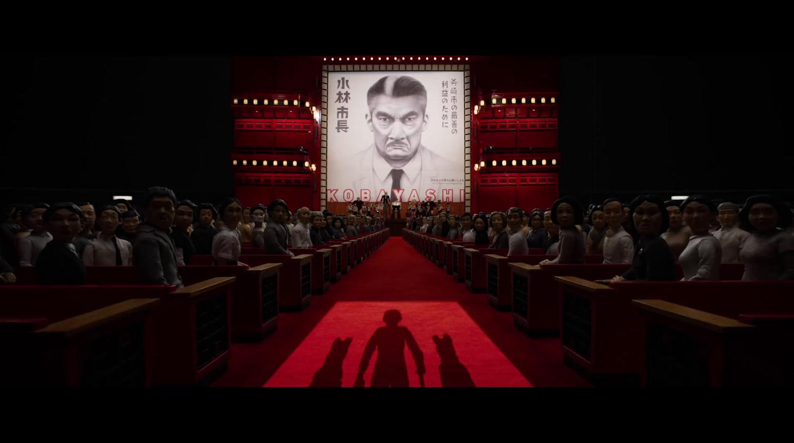 a man standing in front of a crowd of people