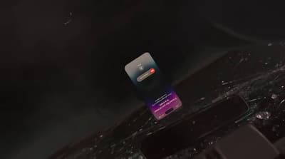 a close up of a cell phone on a table