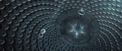 a close up of a metal object with circles on it