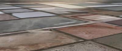 a tile floor with different colors and shapes