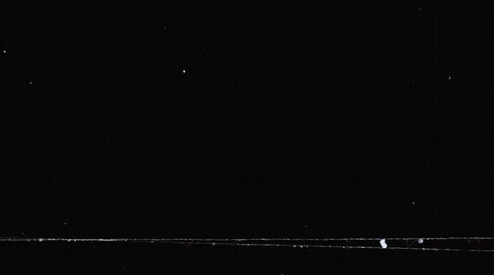 a black and white photo of a person on skis
