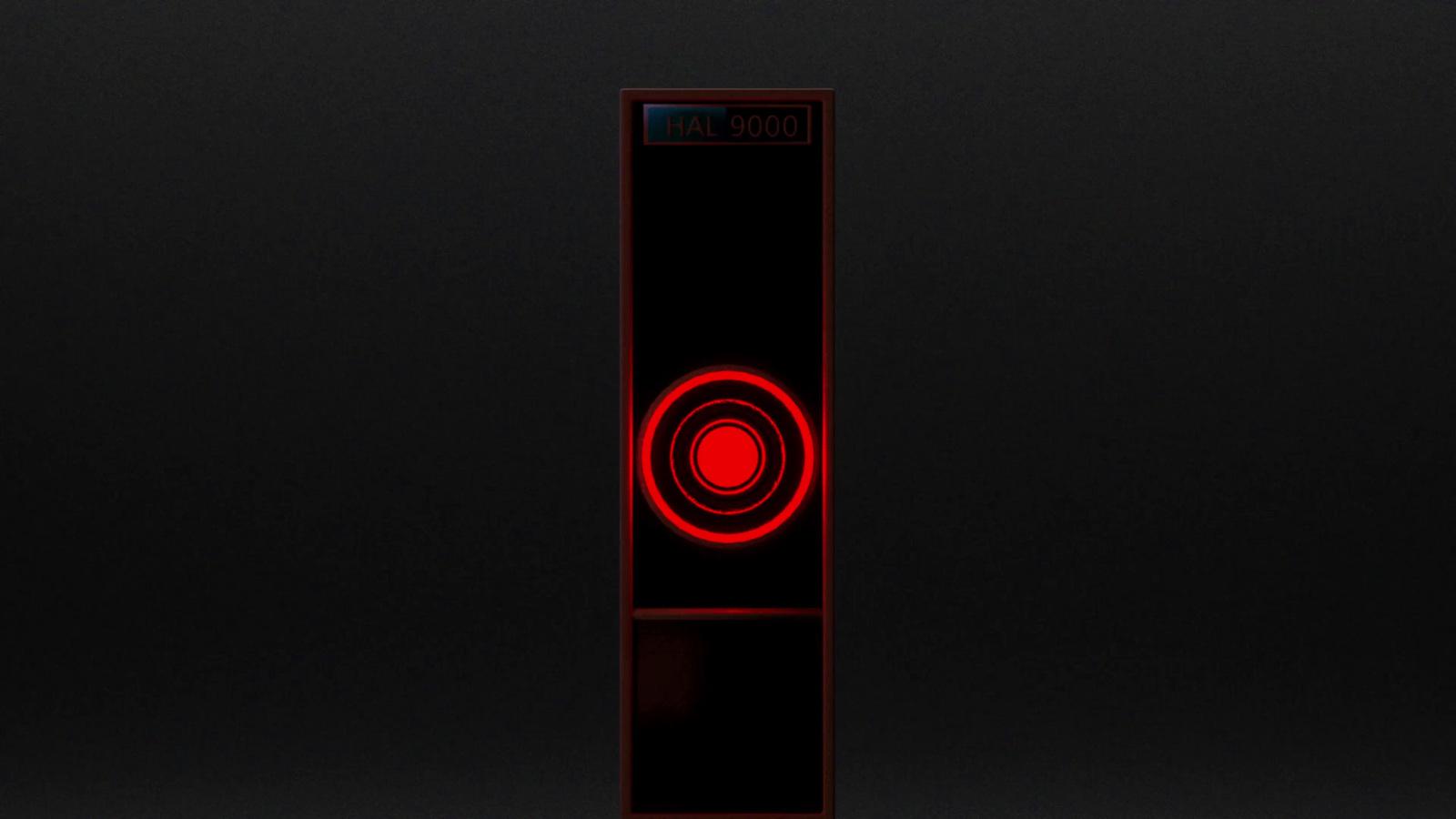a red light is shining on a black background