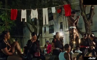 a group of people sitting around each other
