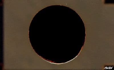 a hole in the side of a metal object