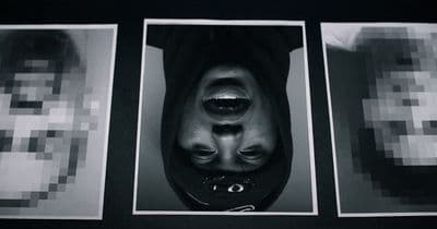 a black and white photo of a person's face