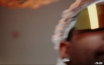 a close up of a person wearing a pair of ski goggles
