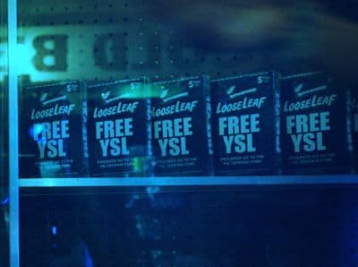 a store shelf with a bunch of freebies on it