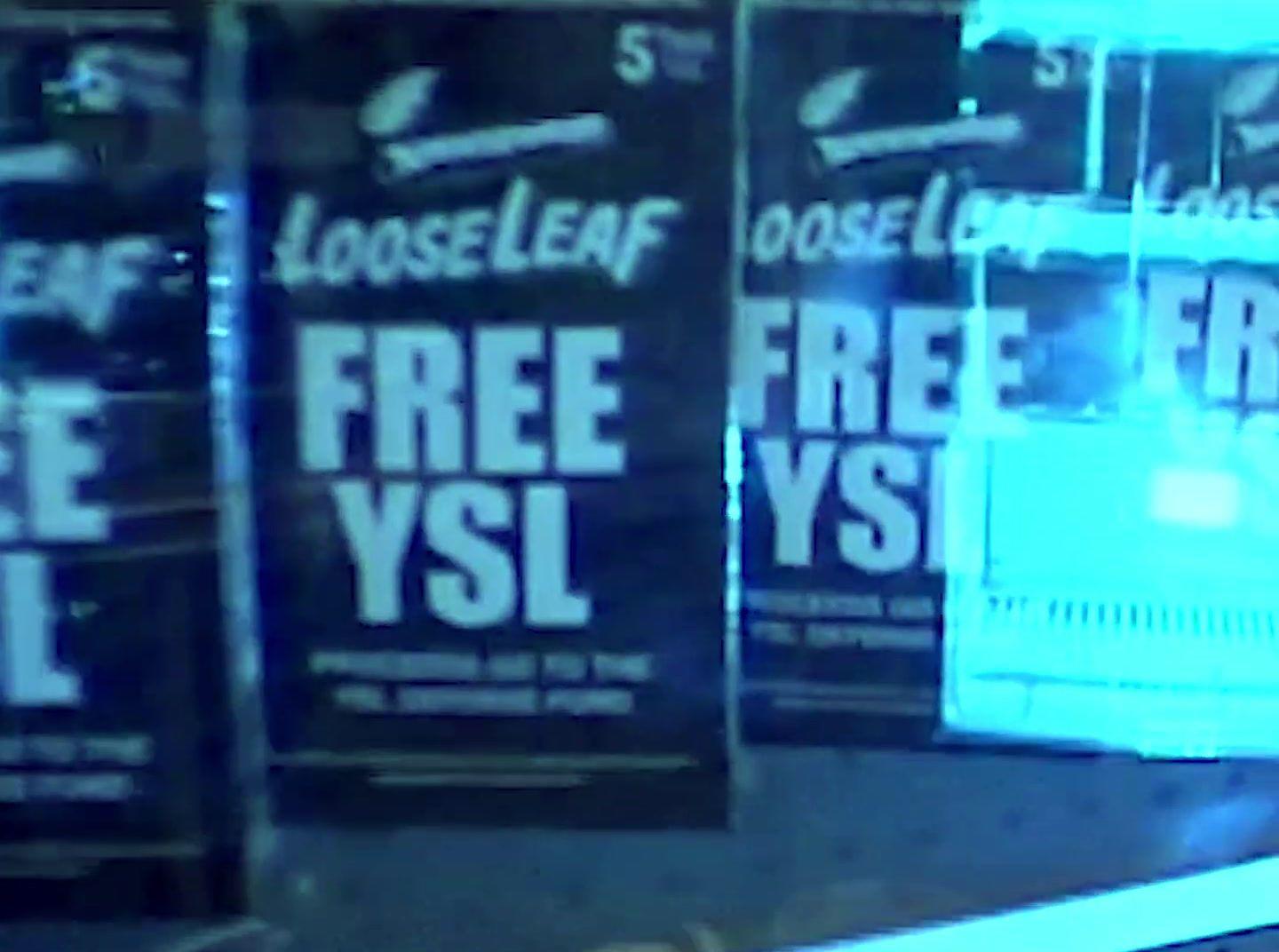 a close up of posters on a wall