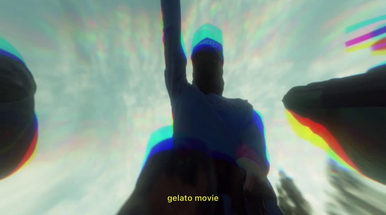 a blurry image of a man holding a baseball bat