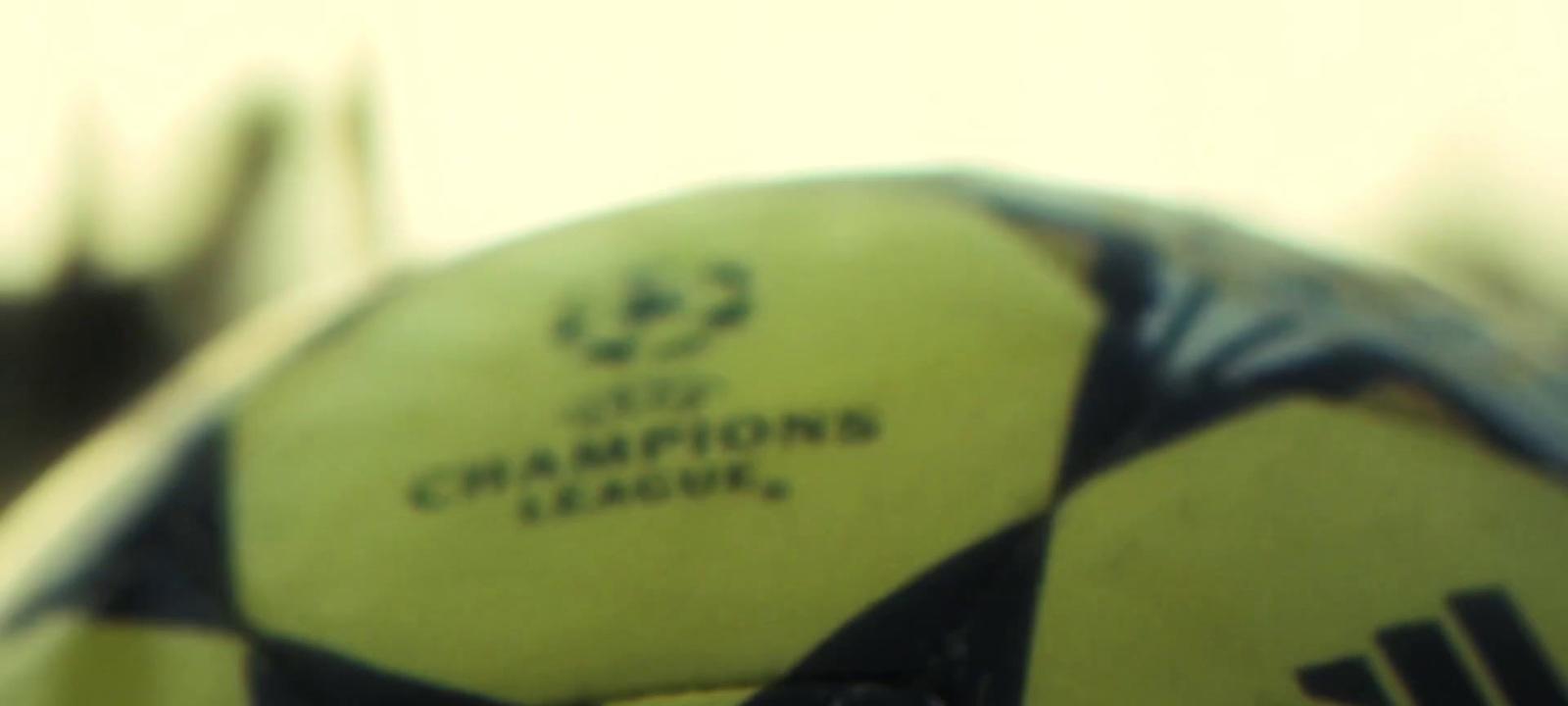 a close up of a soccer ball with a blurry background