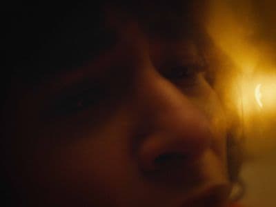 a blurry photo of a woman's face